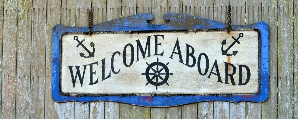 Sign saying "Welcome Aboard"